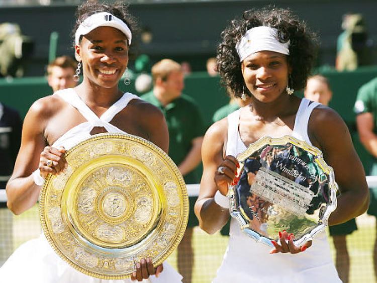 Venus and Serena Williams playing tennis