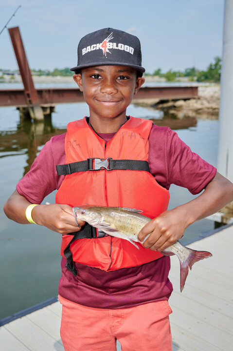 Kid Holding Fish