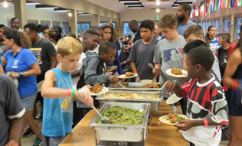 Campers getting a healthy meal.