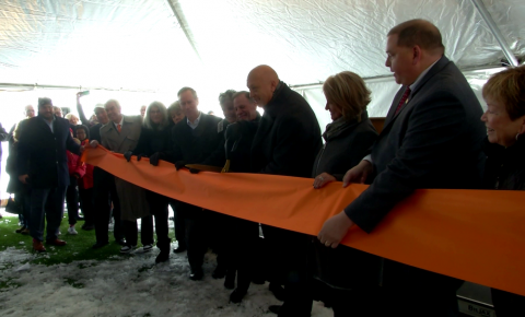 Cal Ripken Jr. cutting the ribbon at a ceremony